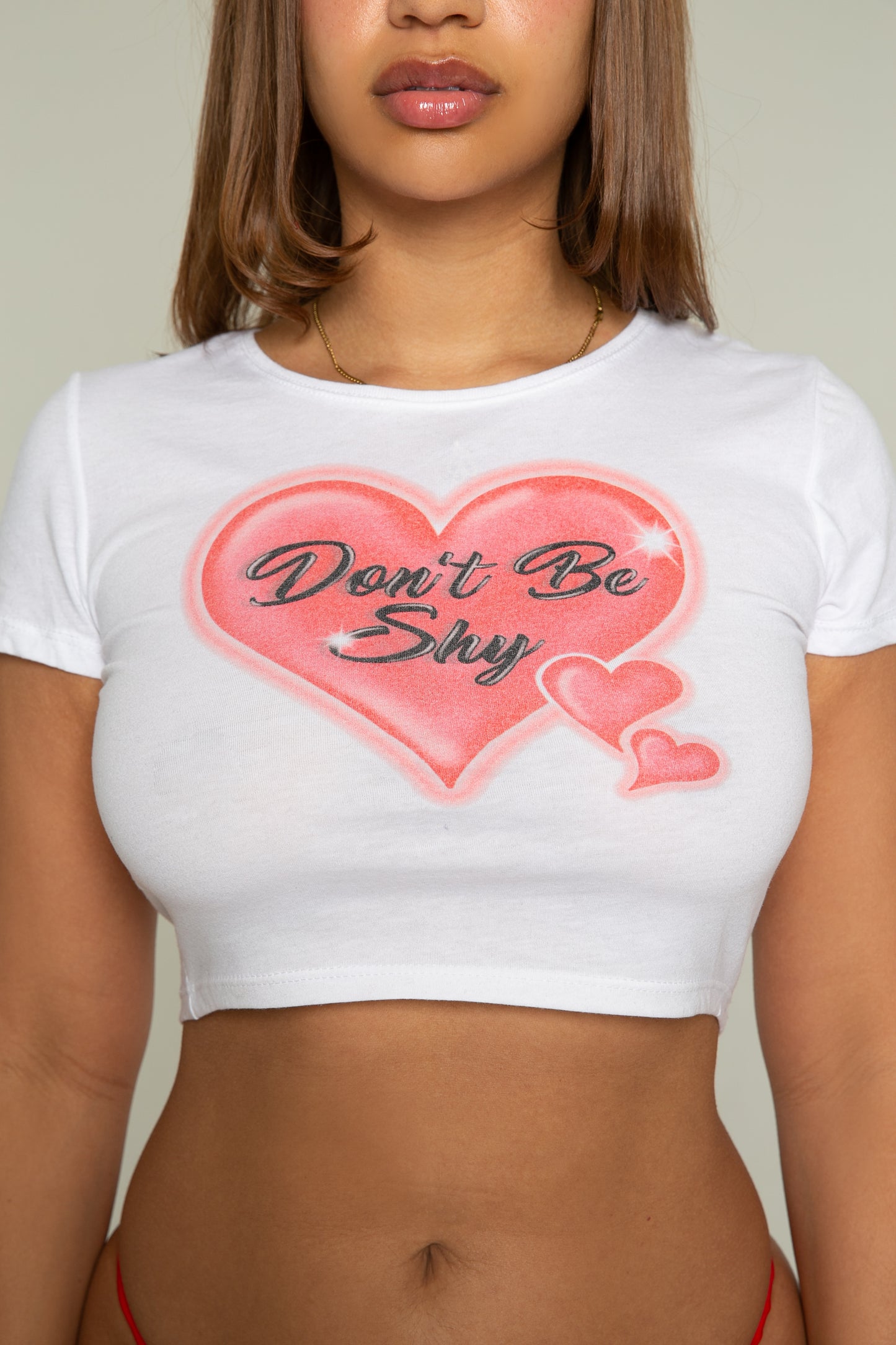 DON'T BE SHY BABY TEE